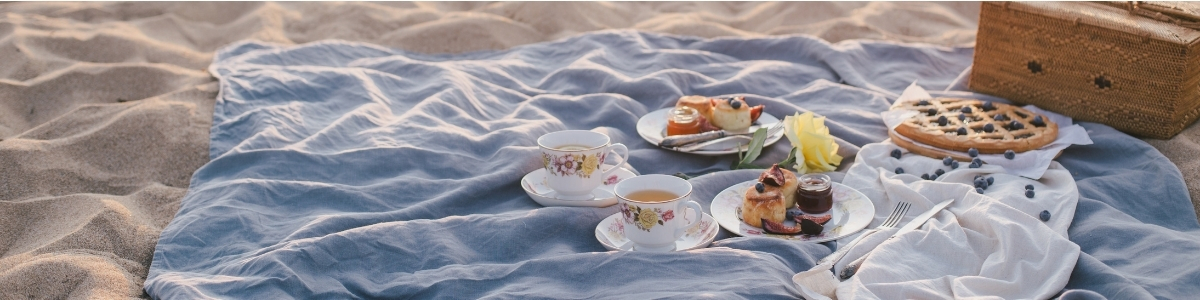 Laboratorio de Análisis en Barcelona, Madrid y Málaga - Análisis Clínicos | La microbiota en vacaciones: viajes, excesos y cambios de dieta